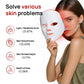 Woman holding a Glaminor LED face mask with skin analysis graphics on a white background